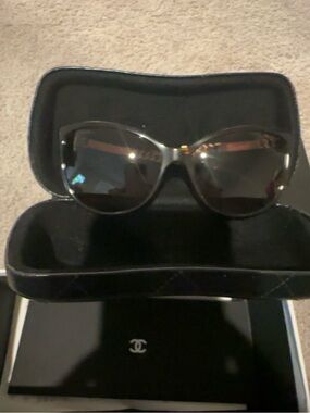 CHANEL Black Cat-Eye Sunglasses with Gold Accent
